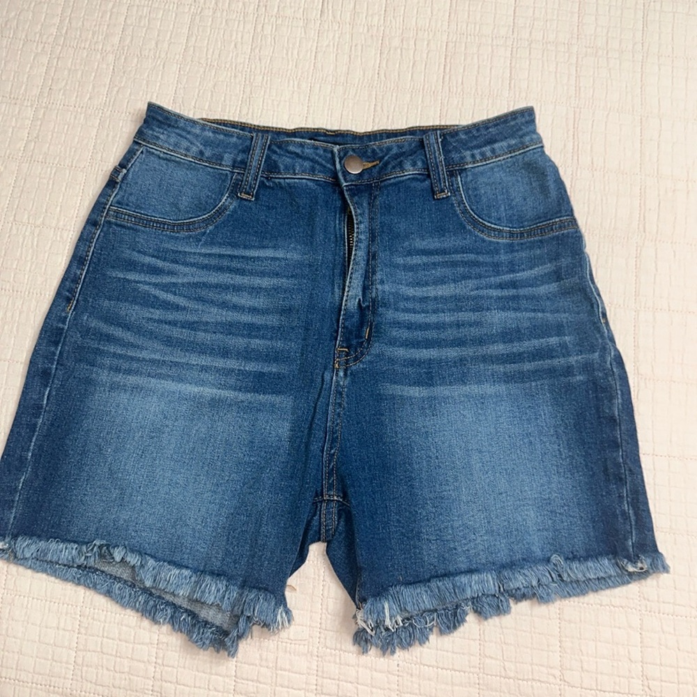 Women’s FashionNova high rise  denim shorts size 13. New, never worn. Runs small